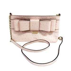 Kate Spade Charm City Presley crossbody bag in ostrich-embossed leather in Pink
